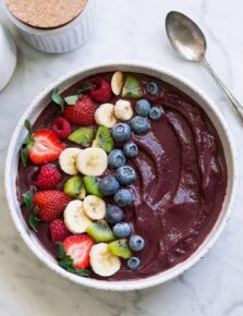 Acai bowl topped with fresh fruit