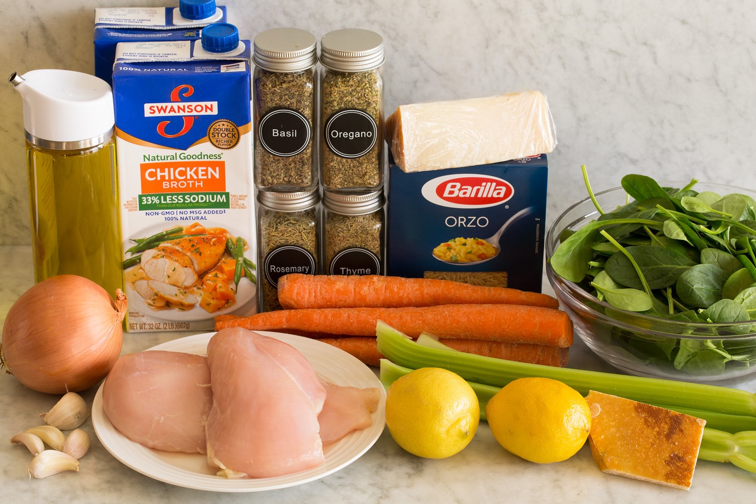 Ingredients needed to make lemon chicken orzo soup.