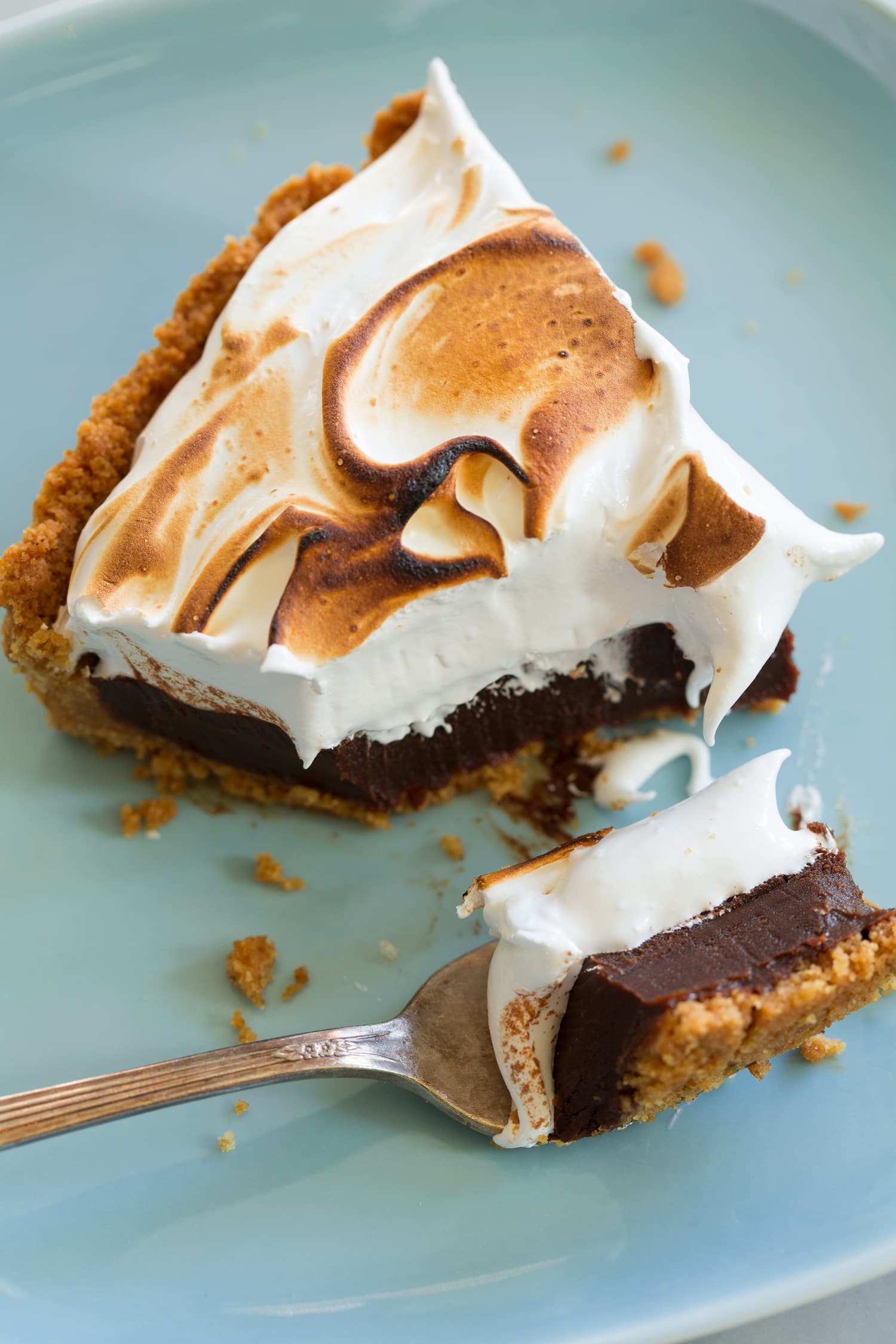 Pie slice cut into with fork.